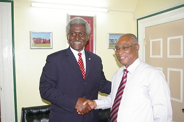 (L-R) United States Ambassador His Excellency, Larry L. Palmer meeting with Premier of Nevis, Hon. Joseph Parry