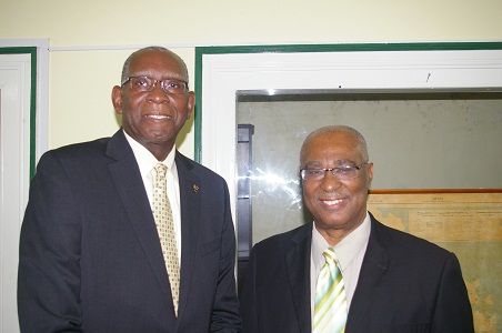 (L- R) UVI President, Dr. David Hall and Premier of Nevis, Hon. Joseph Parry at the Premiers Bath Hotel Office