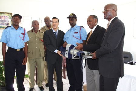Resident Ambassador for the Federation from the Republic of China/Taiwan His Excellency Li-Jey Tsao presents the pair of Jaws of Life to the St. Kitts and Nevis Fire and Rescue Services on Nevis. Also present at the handing over ceremony was Chief Fire Officer Hester Rawlins (second from left), Assistant Commissioner of Police Robert Liburd (third from left), Premier of Nevis Hon. Vance Amory (second from right) and Federal Minister of Foreign Affairs and Homeland Security Hon. Patrice Nisbett