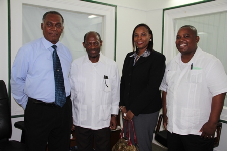 (L-R) Premier of Nevis Hon. Vance Amory, Prime Minister of St. Kitts and Nevis the Right Hon. Dr. Denzil Douglas, Financial Secretary Hilary Hazel and Comptroller of the St. Kitts and Nevis Inland Revenue Department Edward Gift