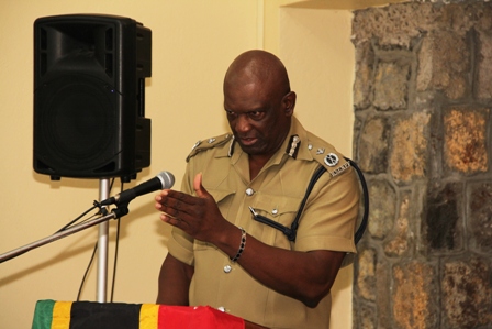 Assistant Commissioner of Police stationed on Nevis Robert Liburd delivering remarks at the Royal St. Christopher and Nevis Police Force, Nevis Division’s annual New Year Programme at the Charlestown Police Station recreation room