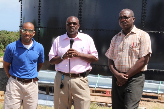 (l-r) Roger Hanley, Manager of the Nevis Water Department, Principal Assistant Secretary in the Ministry of Communication and Works Denzil Stanley with Permanent Secretary in the Ministry of Communication and Works Ernie Stapleton at Spring Hill where the second water tank is located