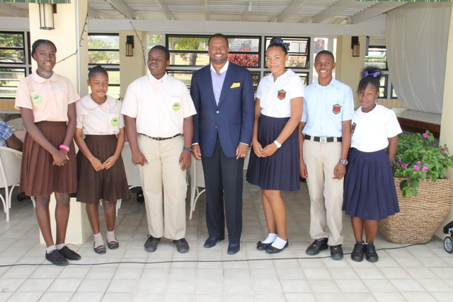 Minister of Tourism and Deputy Premier in the Nevis Island Administration, Hon Mark Brantley at the Mount Nevis Hotel with the participants of the 2014 Bank of Nevis Ltd. Tourism Youth Congress on April 24, 2014