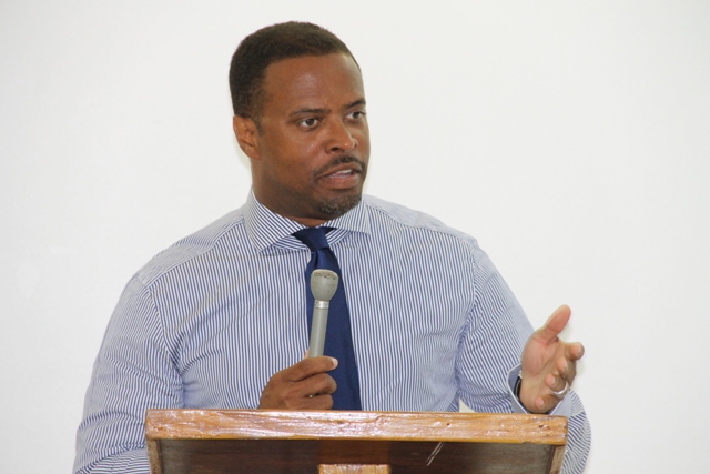 Deputy Premier and Minister of Tourism in the Nevis Island Administration Hon. Mark Brantley delivering remarks at the first phase of the Hospitality Assured programme at the Oualie Beach Resort conference room on May 12, 2014, jointly sponsored by the Caribbean Tourism Organization, the Organization of American States and the Nevis Island Administration