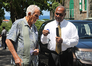 Retired businessman Charles Brisbane hands over the keys to a new Suzuki Grand Vitara to Premier of Nevis and Security Minister Hon. Vance Amory at Bath Hotel, Bath Plain on September 18, 2014