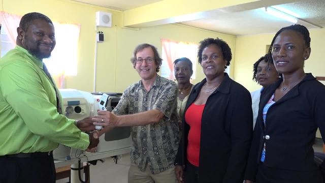 (L-r) Mr. Donavan Herbert, Manager in the Research and Statistics Department at the St. Christopher and Nevis Social Security Board handing over eye care equipment to Dr. Raymond Hubbe, Specialist and Director of the Nevis Eye Care Programme, Nurse Ermine Jeffers, Coordinator of Community Nursing Services, Dr. Judy Nisbett, Medical Officer of Health on Nevis, Nurse Elvereene Bussue, Head of the Cotton Ground Health Centre and Mrs. Shelisa Martin-Clarke, Acting Permanent Secretary in the Ministry of Health at the handing over ceremony at the Alexandra Hospital on November 22, 2017
