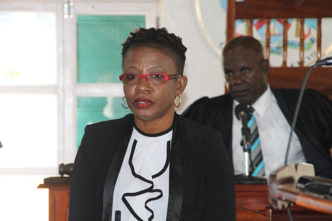 Ms. Myra Williams, Clerk of the Nevis Island Assembly at a sitting of the Assembly at Hamilton House. Hon. Farrell Smithen, President of the Nevis Island Assembly is in the background (file photo)
